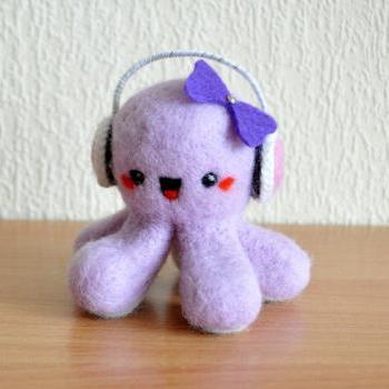 Kawaii octopus lavender color with pink earphones and violet bow